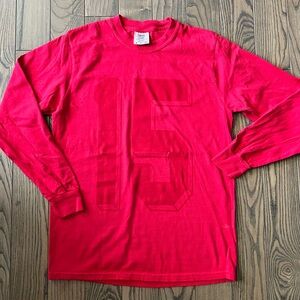 Long sleeved red tee shirt